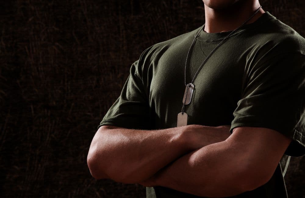 Is Camp Geiger Part of Camp Lejeune Water Contamination featured image; image of soldier in tshirt with arms crossed